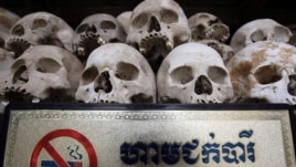 Human sculls are displayed in the stupa of Choeung Ek, a former Khmer Rouge "killing field" dotted with mass graves about nine miles (15 kilometers) south of Phnom Penh, 