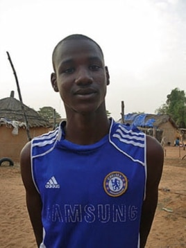 Sixteen-year-old Oumar Alassane Ba is a Senegalese-born, Mauritanian refugee, who is the top student at his community high school and was named best overall student in the region, in Ndioum, Senegal, November 2011.