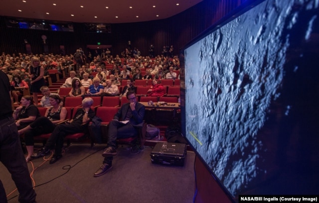 New Horizons media briefing shows some of the first data and images collected since the spacecraft's fly-by of Pluto, at the Johns Hopkins University Applied Physics Laboratory (APL), Laurel, Maryland, July 15, 2015.