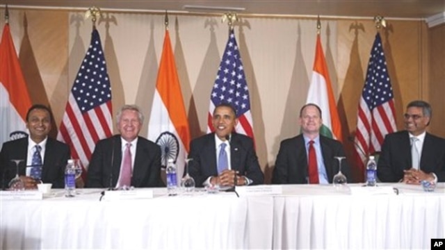 President Barack Obama seated with, from left to right, Anil Ambani of Reliance Anil Dhirubhai Ambani, General Electric's Jeffrey Immelt, Boeing's Christopher Chadwick, Bhupendra Khansagra of India's Spice Jet, as he holds a roundtable discussion with CEO