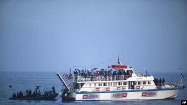 Israeli soldiers raid a ship as the navy intercepts a Gaza-bound aid flotilla in the Mediterranean Sea, 31 May 2010