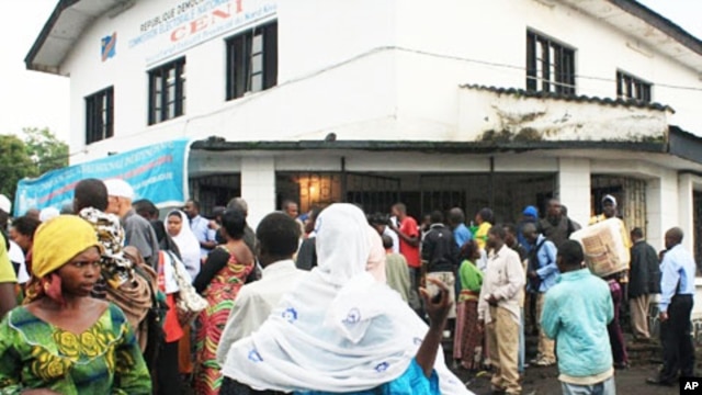 Outside the election board in North Kivu capital, Goma, crowds wait for hours for replacement cards, November 25, 2011.