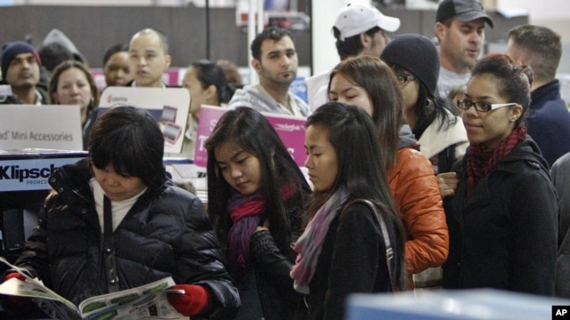 Customers wait in line to shop for 'Black Friday' discounts at a Best Buy store on Nov. 23, 2012 in Philadelphia, Pennslyvania.