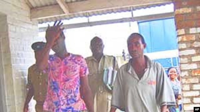 Tiwonge Chimbalanga and Steven Monjeza are taken into custody after celebrating their engagement
