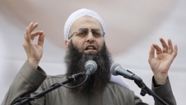 Sheikh Ahmad Assir speaks during a demonstration in solidarity with Syria's anti-government protesters, in Beirut March 4, 2012. 