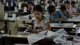 Workers at a garment in Burma.