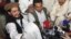 Pakistan Taliban commander Hakimullah Mehsud (L) is seen with his arm around Taliban chief Baitullah Mehsud during a news conference in South Waziristan in this May 24, 2008 file photo. The Pakistani government has received reports that shooting broke out
