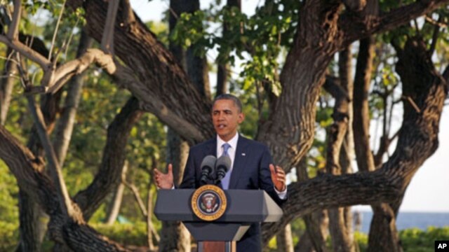 U.S. President Barack Obama speaks at his news conference at the conclusion of the APEC Summit in Honolulu, Hawaii, November 13, 2011.