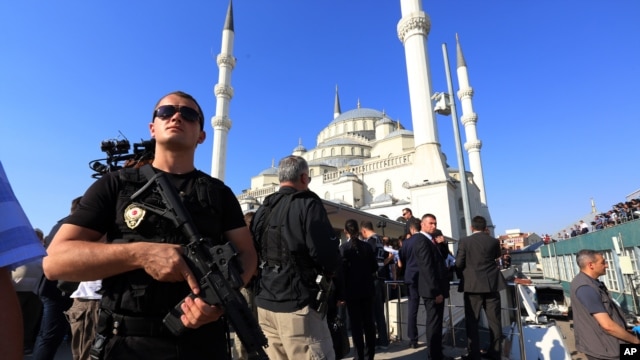 A Turkish special security force member stands guard during a mass funeral for the victims of a failed military coup last Friday, at Kocatepe Mosque in Ankara, Turkey, July 17, 2016.
