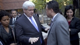 Former Republican presidential candidate Newt Gingrich meets with Asian-Americans at a campaign stop earlier this year. 