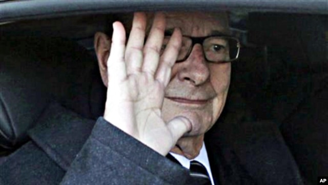 Former French President Jacques Chirac leaves his office in Paris, March 7, 2011
