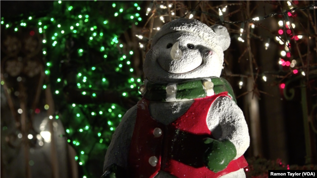 A giant snowman is part of the light display in Dyker Heights, New York.