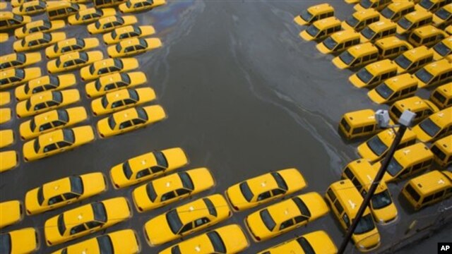 Parking lot full of yellow cabs flooded as a result of superstorm Sandy, Hoboken, NJ, Oct. 30, 2012.