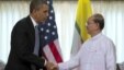 US President Barack Obama, left, shakes hands with Burma