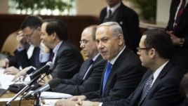 Israel's Prime Minister Benjamin Netanyahu (2nd R) attends the weekly cabinet meeting in Jerusalem, January 13, 2013.