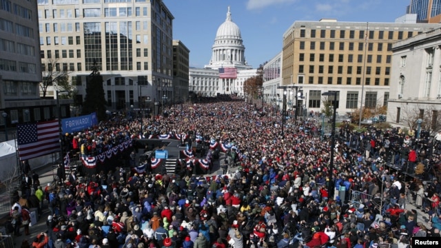U.S. President Barack Obama addresses thousands in Madison, Wisconsin, November 5, 2012, on his last day of campaigning.