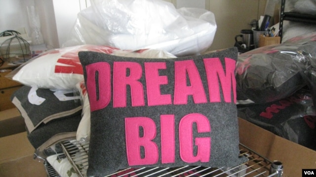 Alexandra Ferguson's mother is helping her daughter grow her pillow business. (VOA/A. Milne-Tyte)