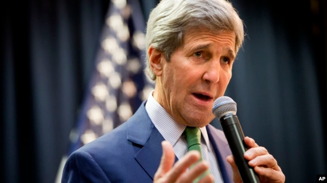 U.S. Secretary of State John Kerry speaks to U.S. Embassy staff in Riyadh, Saudi Arabia, Sunday, Jan. 24, 2016, before leaving Saudi Arabia. Kerry is in Saudi Arabia on the second leg of his latest round-the-world diplomatic mission, which will also take him to Laos, Cambodia and China. (AP Photo/Jacquelyn Martin, Pool)