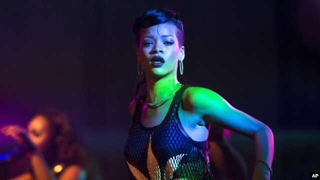 Barbadian singer Rihanna performs during the fifth stop of her 777 worldwide tour at the E-Werk club in Berlin, Nov. 19, 2012.