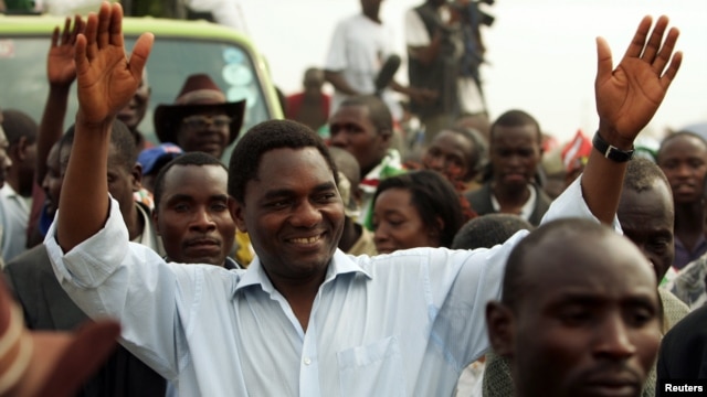 Hakainde Hichilema, then presidential candidate in Zambia's elections, greets his supporters at Zingalume compound in Lusaka, September 26, 2006. 