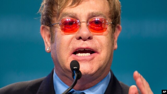 Sir Elton John speaks at the XIX International Aids Conference, July 23, 2012, in Washington.