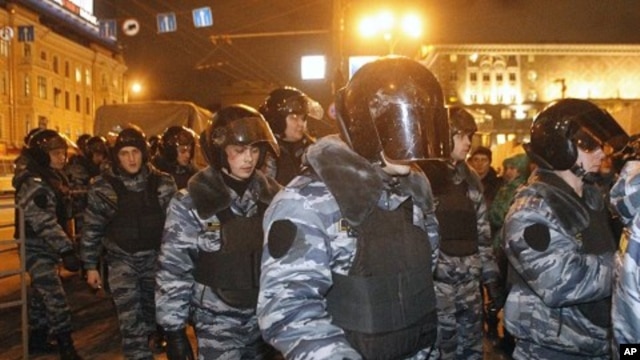 Police arrive at Triumphal Square during protests against alleged vote rigging in Russia's parliamentary elections in Moscow, Russia, December 6, 2011.