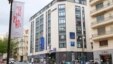 Journalists stand outside Novotel hotel, where jewels meant for film stars were stolen, Cannes, France, May 17, 2013.