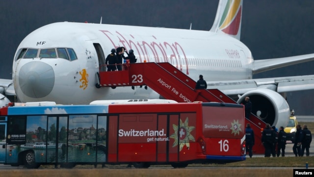 Swiss authorities detained the hijacker of an Ethiopian Airlines flight that was forced to land at Geneva's international airport, Feb. 17, 2014.
