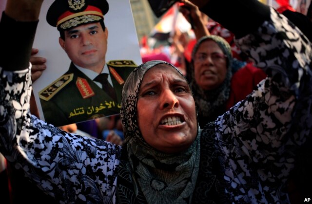 Opponents of Egypt's ousted President Mohammed Morsi rally in Tahrir Square in Cairo, Egypt, July 7, 2013.