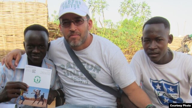 Gabriel Stauring, pictured here with two refugees, Rahma and Murtada, has been coordinating the Darfur United effort. (Photo courtesy i-Act charity)