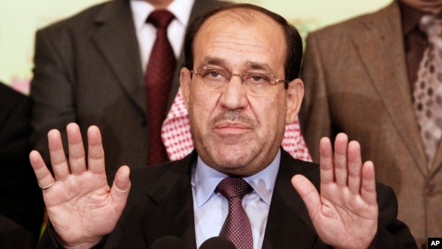 FILE -  Iraqi Prime Minister Nouri al- Maliki speaks to the press in Baghdad, Iraq.