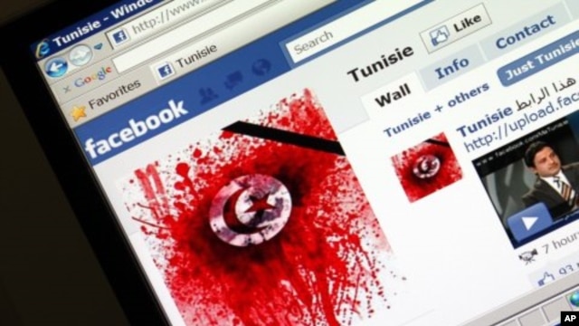 A student-run Facebook page shows an image depicting the Tunisian national flag smeared in red on a computer screen, 11 Jan 2011.