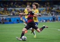Germany's Andre Schuerrle scores his side's seventh goal during the World Cup semifinal soccer match between Brazil and Germany at the Mineirao Stadium in Belo Horizonte.