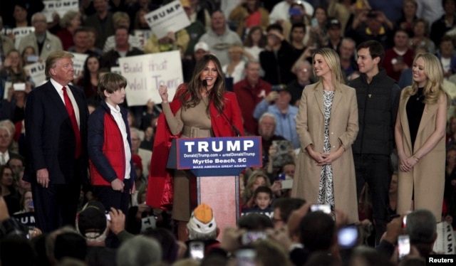 FILE - Melania Trump talks to the crowd as U.S. Republican presidential candidate Donald Trump introduces his family at a rally at the Myrtle Beach Convention Center in Myrtle Beach, South Carolina, Nov. 24, 2015.