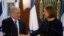 Israel's Prime Minister Benjamin Netanyahu (L) shakes hands with former Foreign Minister Tzipi Livni, head of the centrist Hatenuah party, during their joint statement at the Knesset, the Israeli parliament, in Jerusalem, February 19, 2013.