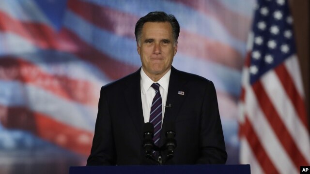 Republican presidential candidate and former Massachusetts Gov. Mitt Romney arrives at his election night rally in Boston, early Wednesday, Nov. 7, 2012. 
