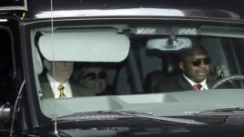 Secretary of State Hillary Clinton, center, is transported on the New York Presbyterian Hospital complex Wednesday, Jan. 2, 2013. 