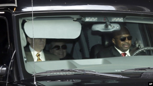 Secretary of State Hillary Clinton, center, is transported on the New York Presbyterian Hospital complex Wednesday, Jan. 2, 2013. 