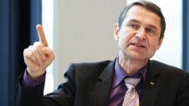 FIFA head of security Ralf Mutschke gestures during an interview with journalists at the Home of FIFA in Zurich, January 15, 2013.