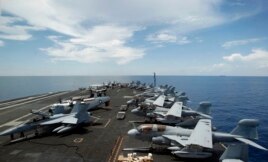 Chiến đấu cơ của Mỹ trên boong tàu sân bay USS Nimitz trong một cuộc tuần tra ở Biển Đông, ngày 23 tháng 5, năm 2013.