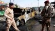 Iraqi security force members gather at the site of a car bomb attack in front of a crowded popular restaurant in Basra, southeast of Baghdad, Iraq, May 20, 2013.