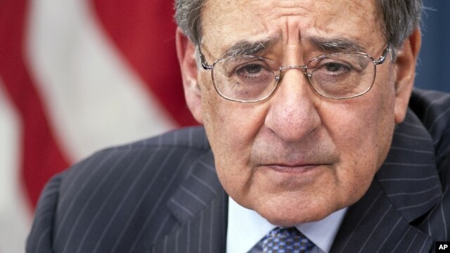 Defense Secretary Leon Panetta participates in a news conference at the Pentagon, Thursday, Jan. 24, 2013, where he announced he is lifting a ban on women serving in combat. 