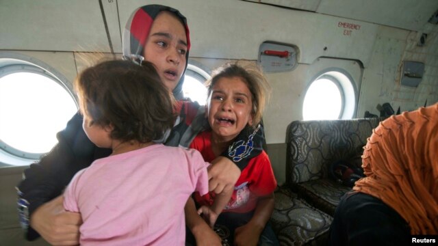 Phụ nữ và trẻ em được sơ tán khỏi Amerli, phía bắc Baghdad.