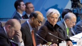 Chief of the International Monetary Fund, Christiane Lagarde, secont right, attends the summit of financial ministers and heads of central banks of the G20 group of nations in Moscow, Russia, February 16, 2013. 