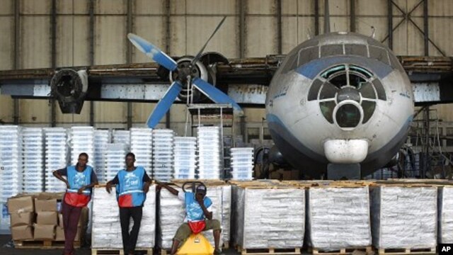 Congolese National Independent Electoral Commission workers wait to load planes and helicopters with election related equipment and ballots at Kinshasa Airport in Kinshasa, Democratic Republic of Congo, November, 25, 2011.


election related equipment 