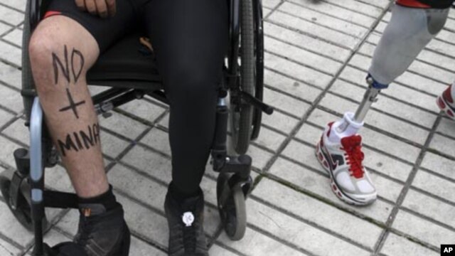 Colombians injured by landmines attend the race "Lend Your Leg 11K" in Bogota, April 1, 2012. The race is one of the activities marking the International Day for Mine Awareness and Assistance in Mine Action by the United Nations.