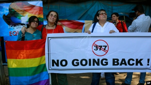 Indian activists in Mumbai protest a law banning same-sex marriage.