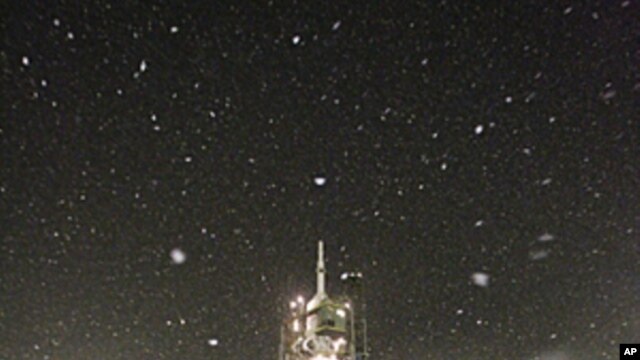 The Soyuz TMA-22 spacecraft rests on its launch pad at Baikonur cosmodrome. Members of the International Space Station (ISS) crew U.S. astronaut Daniel Burbank and Russian cosmonauts Anton Shkaplerov and Anatoly Ivanishin, November 14, 2011.