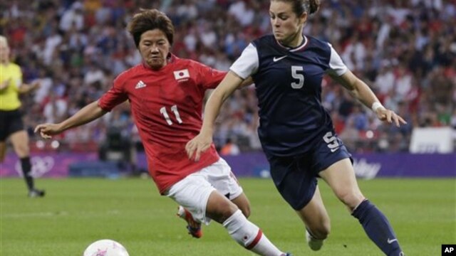 Japan's Shinobu Ohno, left, and US' Kelley O'Hara, vie for ball during women's soccer gold medal match Aug. 9, 2012