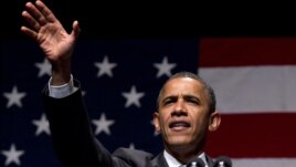 President Barack Obama speaks during a campaign fundraising concert in Miami Beach, Florida, June 26, 2012.